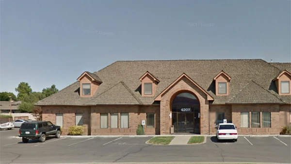 Oral Surgery Yakima WA Office Building HP The clinic exterior and parking lot of the Yakima Oral & Maxillofacial Surgery building